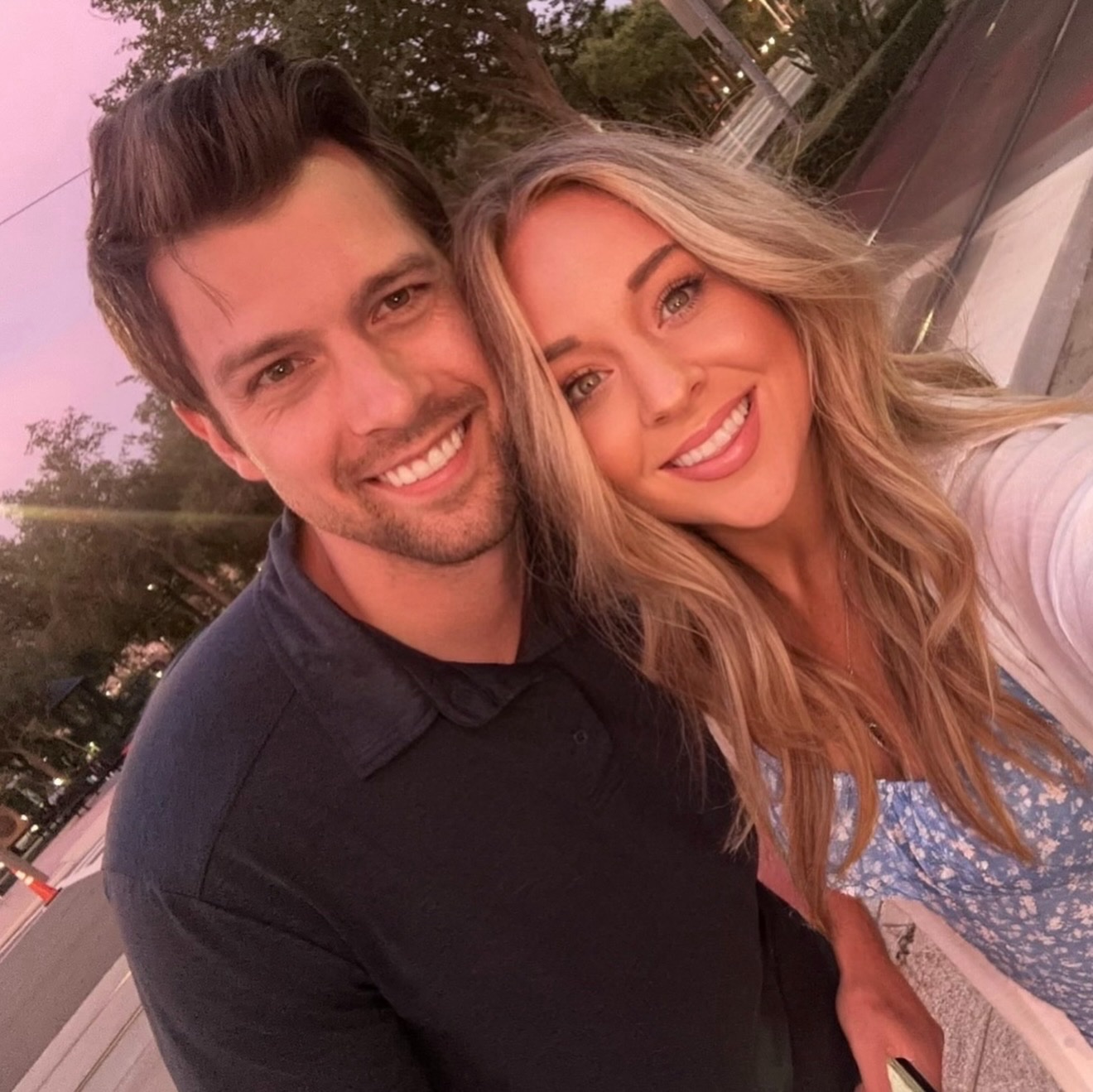 Gentry and his wife smiling together outdoors
